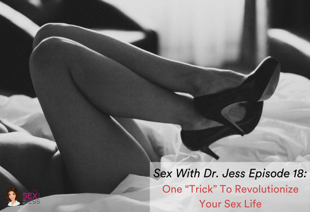 Woman lying on a bed with knees bent and wearing high heels