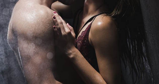 erogenous zones - man with no shirt hugging woman in a seductive top