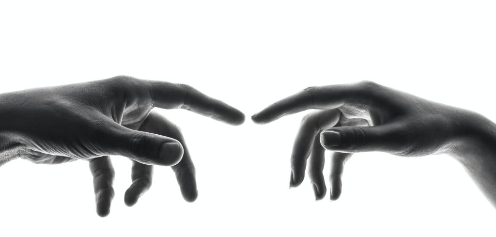Hand fetishes. Two hands gently reaching for each other